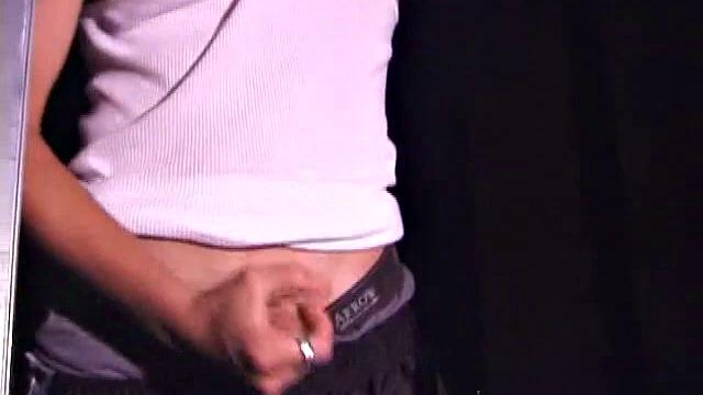 Not content with sitting while he jacks off, Lance teases the neighbors by standing on the roof outside his bedroom window to give everyone a show. Then he finishes by blowing his load onto the floor of his bedroom.