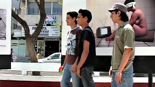 Six young Latinos hook up at an outdoor exhibit and decide to head inside for some private fun. Once indoors, group heads for a sofa where clothes start to get pulled off and big dicks get sucked.
