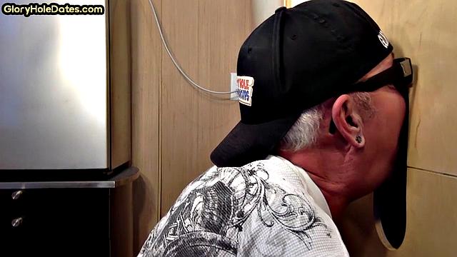 Real gloryhole DILF sucks black dick with pleasure