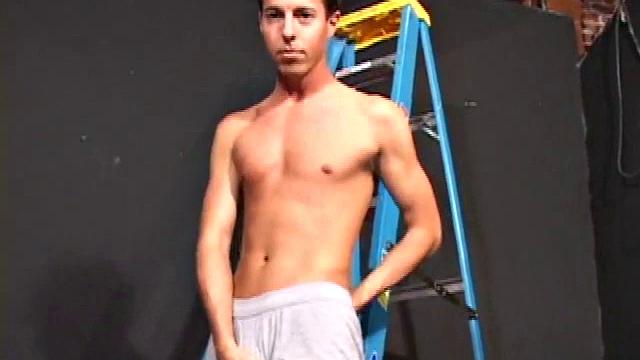 Ryler Jackson decides to take a break from painting and beat off. After stripping naked, the young man strokes his cock with determination, edging himself a few times, before blowing a cum load onto his stomach.