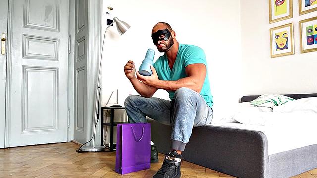 Masked athletic hunk wanks cock with sex toy and cums