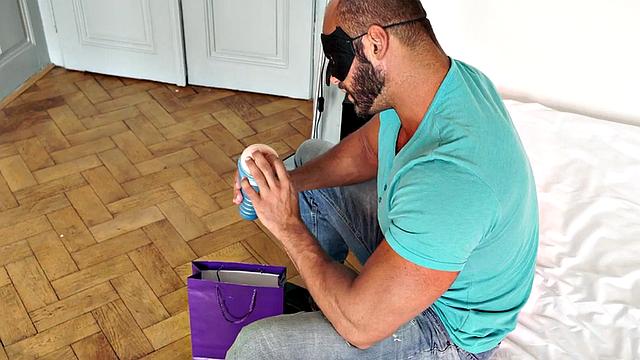 Masked athletic hunk wanks cock with sex toy and cums