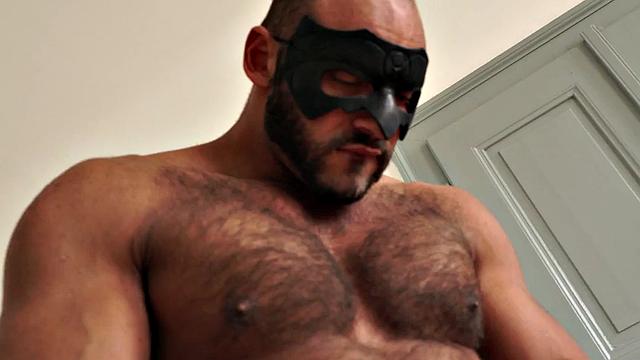 Masked athletic hunk wanks cock with sex toy and cums