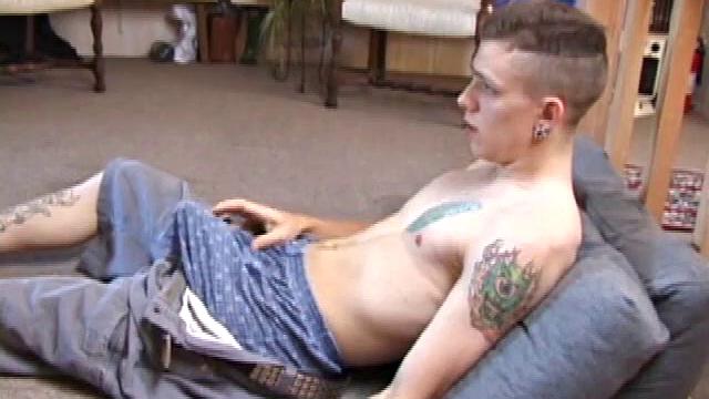 Rubbing his dick through his shorts you can tell this is a monster. Shane licks his fingers and rubs his nipples before the shorts flying off.