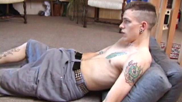 Rubbing his dick through his shorts you can tell this is a monster. Shane licks his fingers and rubs his nipples before the shorts flying off.