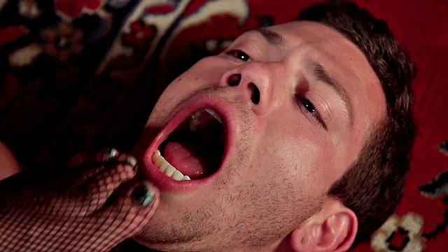 BDSM domina whipping sub and tormenting his genitals