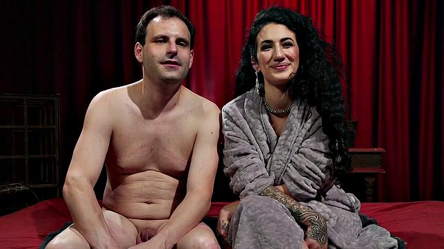 Tattooed domina uses sub in pegging sex with strapon