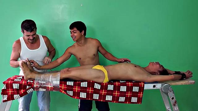 Rave makes his debut appearance on Laughing Asians in this gay Asian tickling fetish scene. This cute Asian boy is strapped down to the tickle rack as resident tickler Vahn Valdez ravages his body with feathers and his wiggling fingers.