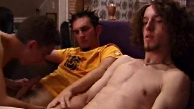 Adam, Chad, and Lukas waste no time in stripping off and getting down to it. Lukas rubs Adam's groin while Chad pulls his pants down and starts rubbing his dick.