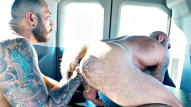 Hunk fists gaydaddy in van with gloved hands