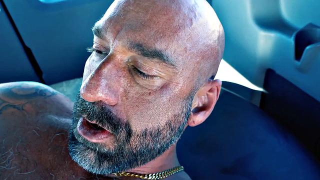 Hunk fists gaydaddy in van with gloved hands