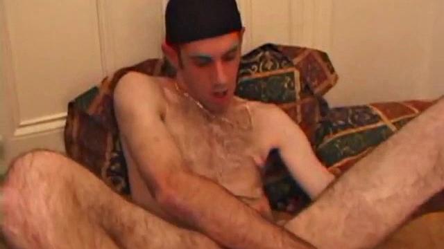 When Tag returns from skateboarding he heads to the bedroom and turns on a video. He begins stripping down and his growing cock flops out. Tag pulls out a couple of sex toys.