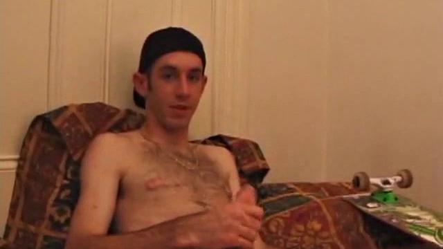 When Tag returns from skateboarding he heads to the bedroom and turns on a video. He begins stripping down and his growing cock flops out. Tag pulls out a couple of sex toys.