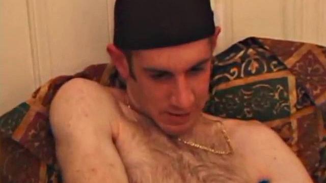 When Tag returns from skateboarding he heads to the bedroom and turns on a video. He begins stripping down and his growing cock flops out. Tag pulls out a couple of sex toys.