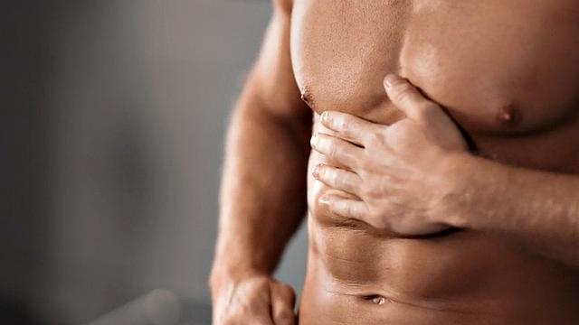 Athletic jock enjoys solo wanking after rubbing in gym