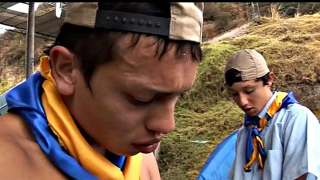 Four Latin twinks camping on a rural mountain side, urge to play, clothes stripping off.