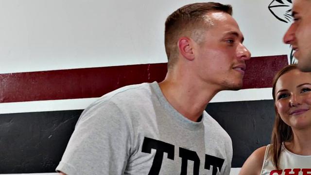 Cheerleader redhead fucked in gym MMF threesome