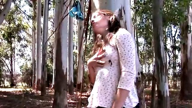 Lesbian Nina shown tits and pussy in the forest