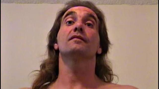 rugged bearded stud strips down and strokes his thick cock for the camera