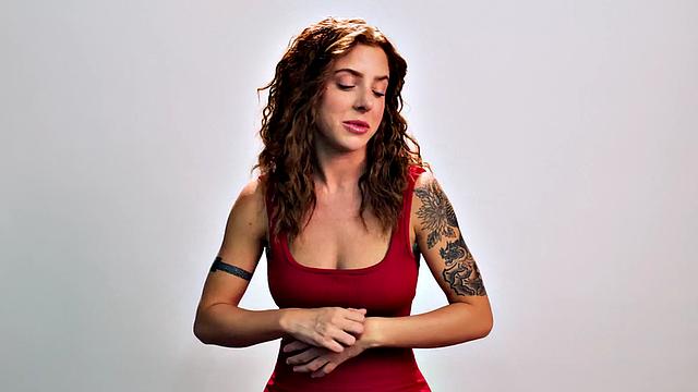 Beauty teasing herself with dildo