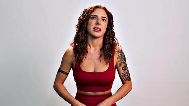 Beauty teasing herself with dildo