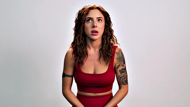 Beauty teasing herself with dildo