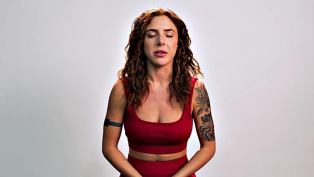 Beauty teasing herself with dildo