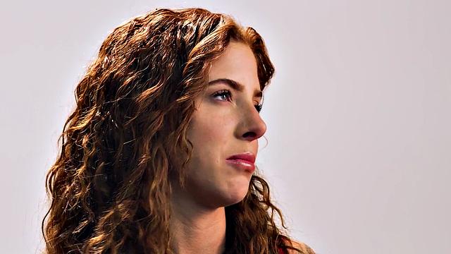 Beauty teasing herself with dildo