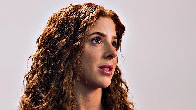 Beauty teasing herself with dildo