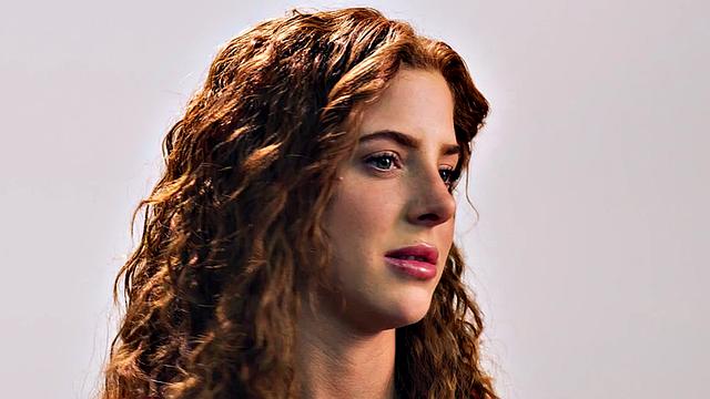 Beauty teasing herself with dildo