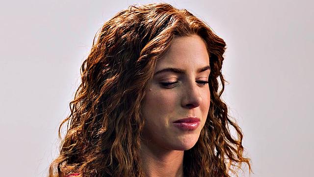 Beauty teasing herself with dildo