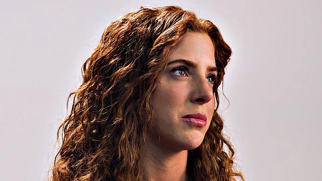 Beauty teasing herself with dildo