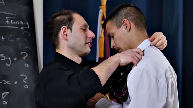 Young Will Sims likes older guys and has always had a thing for Victor, so he decides to see if he can entice the priest. At his desk, Will pulls out his hard and soon the two are kissing passionately.