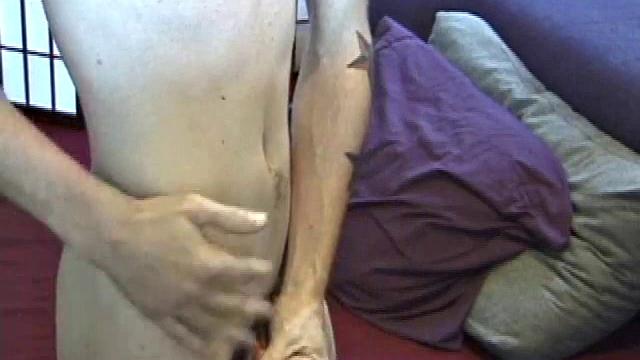 Dan's clothes quickly strip off and he pumps steadily with his left hand, showing the two stars tattooed on his forearm. Lubrication enhances Dan's serious stroke show.