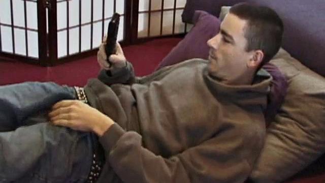 Dan's clothes quickly strip off and he pumps steadily with his left hand, showing the two stars tattooed on his forearm. Lubrication enhances Dan's serious stroke show.