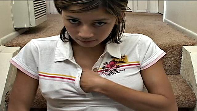 Trixie Teen sits on stairs showing her panties, stripping off, rubbing pussy, exposing nipples, fingering until orgasm