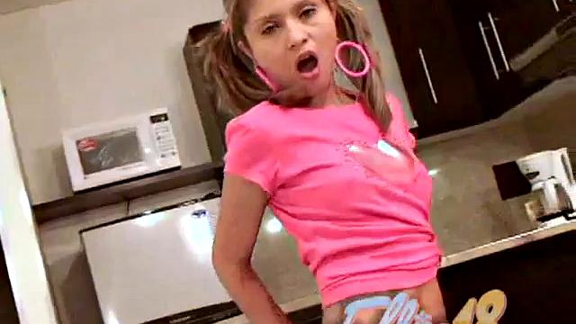 Sexy Teen Ellie is rubbing her pussy