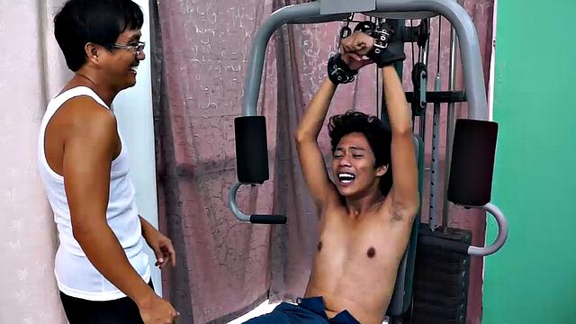 These boys just keep coming for a workout, and they surely get one! This time Asian cutie Idol gets restrained to the equipment for a hearty tickle workout on every muscle of his body.