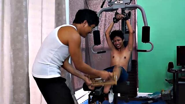 These boys just keep coming for a workout, and they surely get one! This time Asian cutie Idol gets restrained to the equipment for a hearty tickle workout on every muscle of his body.