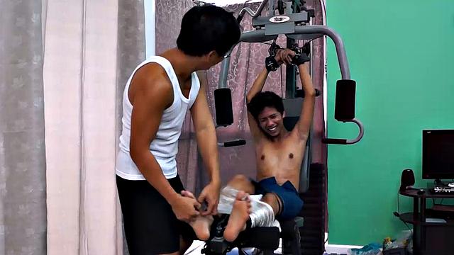 These boys just keep coming for a workout, and they surely get one! This time Asian cutie Idol gets restrained to the equipment for a hearty tickle workout on every muscle of his body.