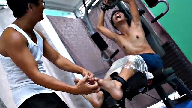 These boys just keep coming for a workout, and they surely get one! This time Asian cutie Idol gets restrained to the equipment for a hearty tickle workout on every muscle of his body.