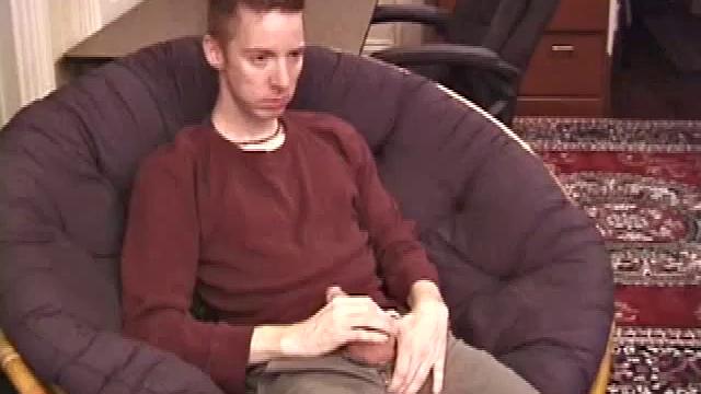 Jonathan Star plays with his dick in jockstrap, sheds clothes, lubes up, strokes cock with determination, teases nipples, edges closer, erupts in hand