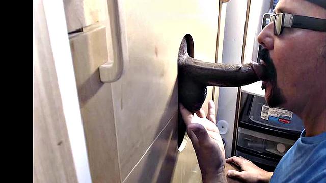 Gloryhole gaydaddy sucks black penis till cum in mouth