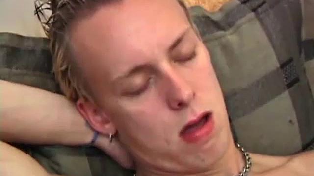 Roar lubes up a red dildo and buries it deep inside naked young ass. In total ecstasy, he slides in and out, while stroking his hard cock. Then he gets on his knees and rams his ass with it from behind.