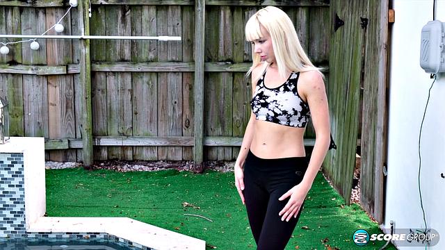 Yoga chick Sveera stretches outside and then loses her clothes, spreads and fingers her snatch.