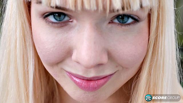 Yoga chick Sveera stretches outside and then loses her clothes, spreads and fingers her snatch.