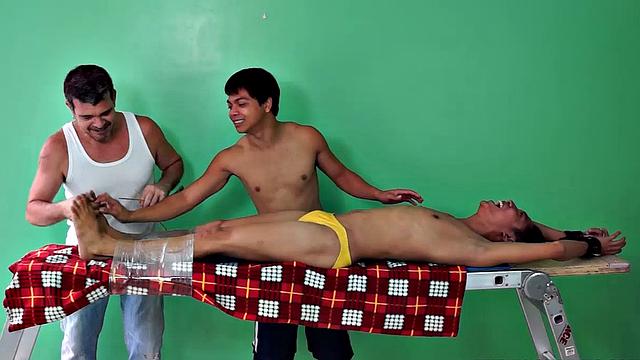 Rave makes his debut appearance on Laughing Asians in this gay Asian tickling fetish scene. This cute Asian boy is strapped down to the tickle rack as resident tickler Vahn Valdez ravages his body with feathers and his wiggling fingers.