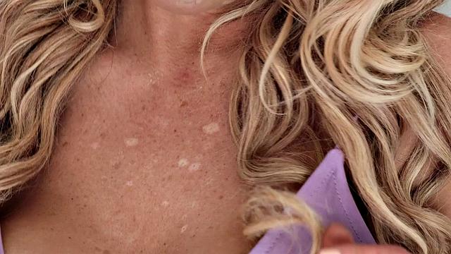 A new MILF with huge tits and a great tail