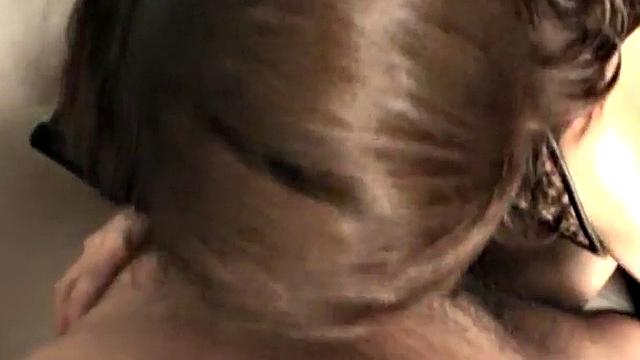 Sexy Japanese MILF sucking on a cock