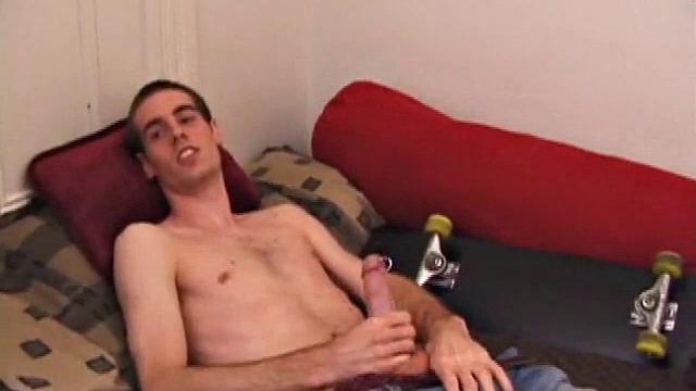 There's some good porn playing on the TV, so James Shafer decides to jack off. He pulls out his pierced dick and strokes it with determination, until he blows his warm cum load.